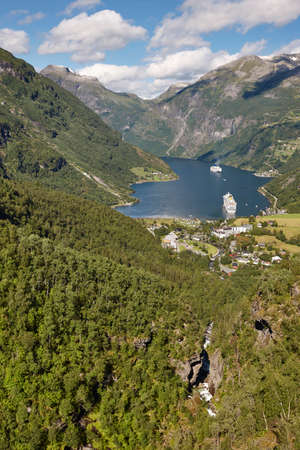 Norwegian fjord landscape. Geiranger village and forest. Cruise travel. Tourismのeditorial素材