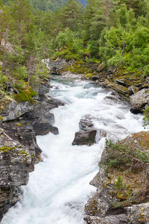 Norway landscape with forest mountains and raume river. Andalsnes. Verticalの写真素材