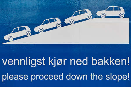 Traffic signal. Proceed down the slope. Norwegian language. Cruise travelの写真素材