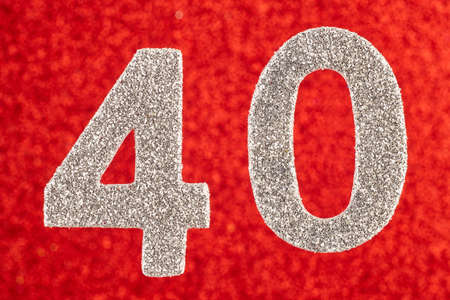 Number forty white color over a red background. Anniversary. Horizontalの写真素材