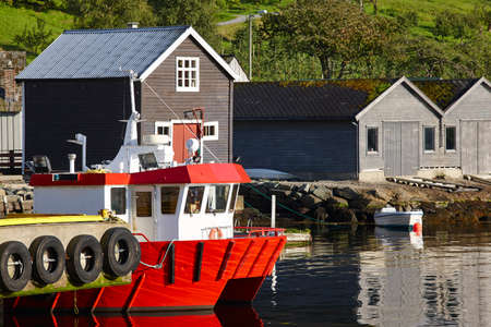 Norwefian fjord village with harbor. Hardanger road route. Jondal. Travel background