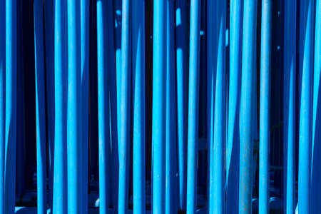 Blue tubular metallic background. Industrial abstract material. Horizontalの写真素材