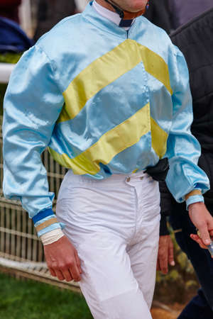 Jockey detail after the race. Hippodrome background. Racehorse. Competitionの写真素材
