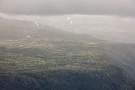 Norwegian mountain landscape on a cloudy day. Fogのeditorial素材
