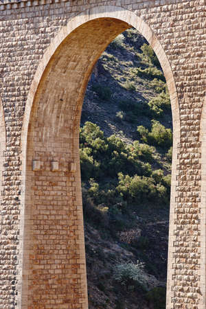 Stone viaduct in Albentosa, Teruel. Spain. Green way. Architectureのeditorial素材