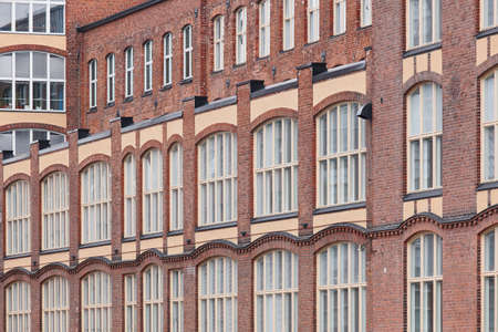 Old red brick facade factory buildings in Tampere, Finland. Suomiの写真素材