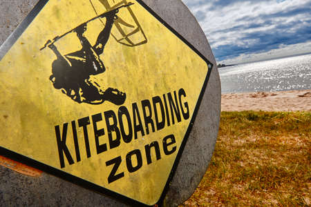 Kiteboarding area signal on a sandy beach. Extreme sport. Horizontalの写真素材