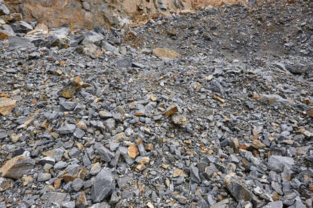 Quarry mineral factory with gravel and stone wall. Excavation industry