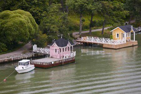 Traditional antique finnish wooden house in the lake. Rural Finlandの写真素材