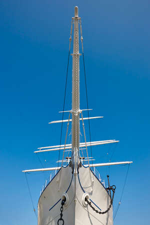 Bow sailboat detail over a blue sky background. Nautic navigationの写真素材