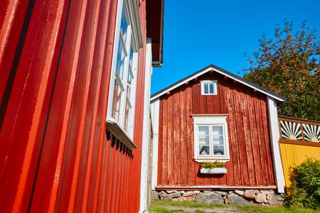 Traditional wooden houses facade in Rauma town. Finland heritage. Horizontalの写真素材