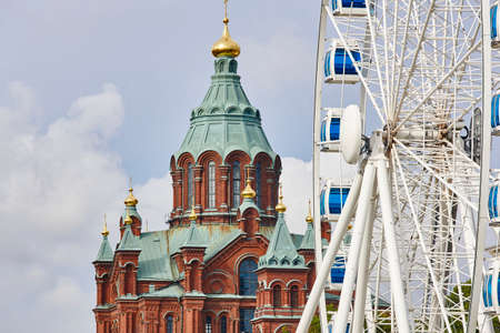 Helsinki skyline city center. Big wheel and Uspenki cathedral. Finlandの写真素材