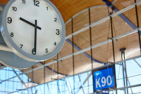 Indoor airport information watch. Departure gates. Travel background. Time. Horizontalの写真素材