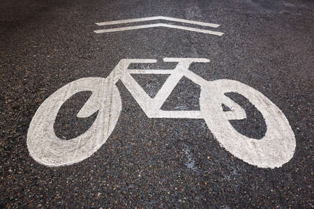 Bikes lane signal on an asphalt street. Urban background. Horizontal