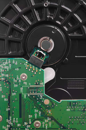 Hard drive disc detail with mother board. Backup device. Vertical