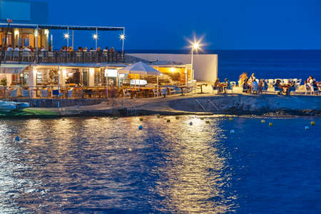 People dinning at the beach. Mediterranean coastline in Spain. Chilloutのeditorial素材