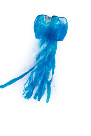 Plastic bottle recycled in a jellyfish figure. Reuse garbabe. Isolatedの写真素材