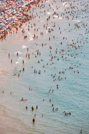 Mediterranean coastline in Spain. Calpe beach. Summer crowd. Alicante seascapeのeditorial素材