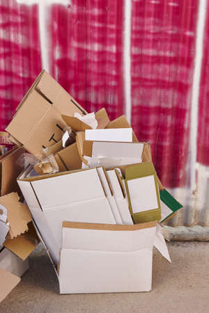Cardboard boxes garbage on the street. Environmental conservation. Recyclable