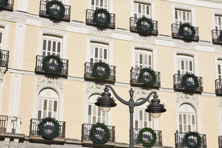Antique classic decorated building facade in Madrid city center. Spainの写真素材