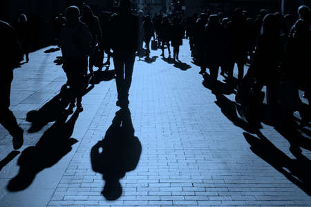 People on the street. Urban crowd in blue tone. Horizontal