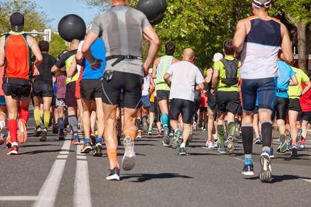 Marathon runners on the street. Healthy lifestyle. Athlete endurance