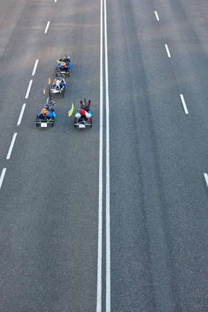 Disabled bike riders on the street. Urban mobility. Sport activityの写真素材