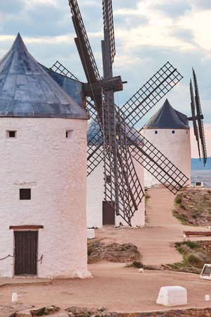 Traditional antique windmills at sunset in Spain. Consuegra, Toledo. Travelの写真素材