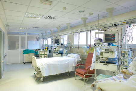 Hospital intensive care unit area with beds equipment. Health center