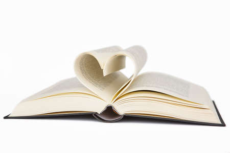 Open book with heart shaped pages. Love for reading. Isolated