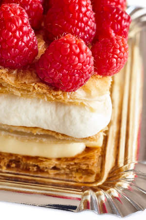 Delicious raspberry cake with puff pastry and cream. Homemade dessert の写真素材