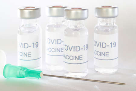 Covid-19 vaccine vials. Coronavirus pandemic infection. Global prevention vaccination