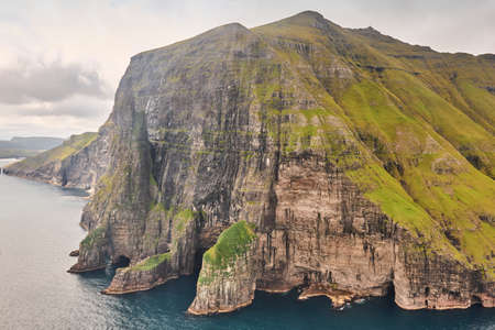 Stack in Faroe islands, Sandavagur. Trollkonufingur in Vagar island coastline.の写真素材
