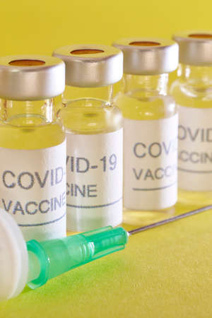 Covid-19 vaccine vial. Coronavirus pandemic infection. Global prevention vaccination