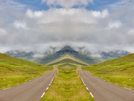 Faroe islands old road surrounded by green fjord landscape. Denmark