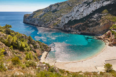 Spanish mediterranean sunny scenic coastline. La Granadella beach. Alicante, Valenciaの写真素材
