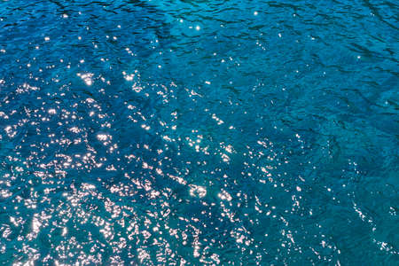 Turquoise green and blue ocean water reflection. Nature backgroundの写真素材