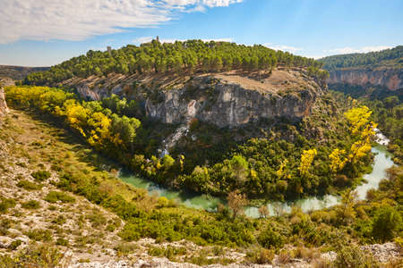 Autumn forest landscape with jucar river canyon. AlarcÃ³n, Cuenca. Spainの写真素材
