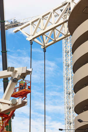 Workers on a construction site. Engineering and architectural infrastructure. Workplace