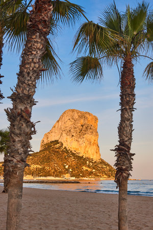 Penon de ifach and mediterranean beach at sunset. Alicante, Spainの写真素材