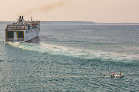 Cruise and traditional boat in mediterranean sea. Mallorca, Spainの写真素材
