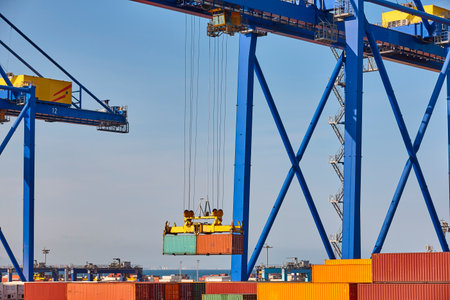 Cranes and containers. Global market. Cargo shipping. International economyの写真素材