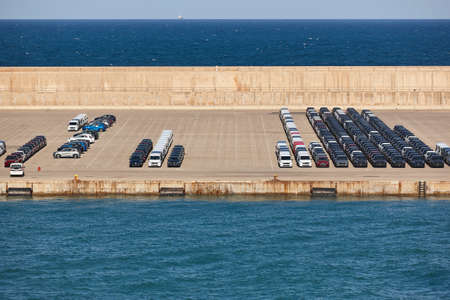 New vehicles in parking lot ready to be shipped. Motor industryの写真素材