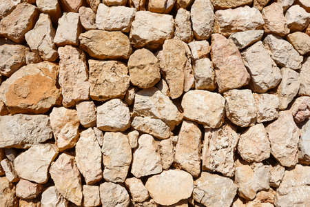 Natural stone textured wall background. Solid outdoor material construction
