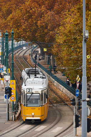 Traditional picturesque public transport yellow tramway in Budapest. Hungaryの写真素材