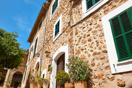 Traditional house facade decorated with plants in Mallorca, Balearic islands