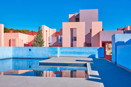 Geometric building with pool. The red wall, Calp, Spain