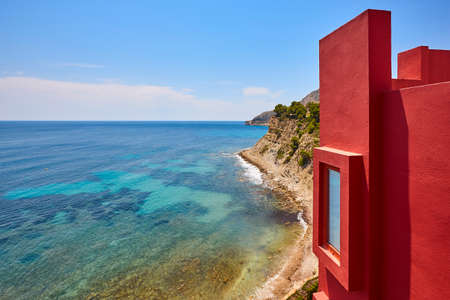 Geometric red building design and mediterranean coastline. Calpe, Spainのeditorial素材