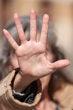 Stop female abuse. Woman against violence. Social victim. Discriminationの写真素材