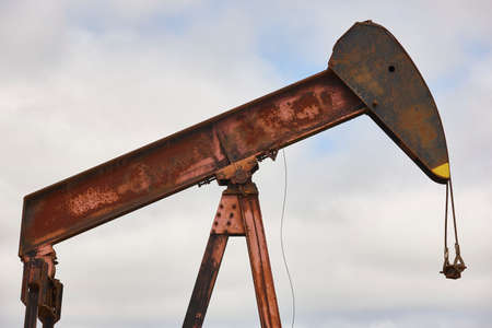 Rusty oil pumping machine. Pump jack in Ayoluengo, Burgos. Spainの写真素材